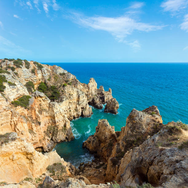 istock Atlantic ocean summer rocky coastline view (Ponta da Piedade, Lagos, Algarve, Portugal). 1469280853