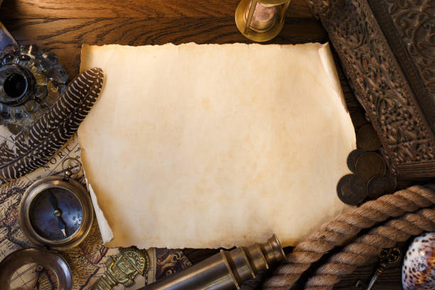 vintage still life with old paper scroll, spyglass, books, old chest. adventure and travel concept. - naval ship imagens e fotografias de stock