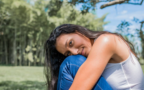 istock Young woman outdoors at the river bank. 1469297421