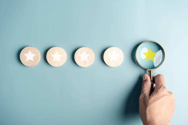 istock Magnifier focus to five star icon, Customer satisfaction feedback review concept. Customer online service experience and business satisfaction. 1469297467