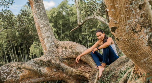 istock Young woman outdoors at the river bank. 1469297651