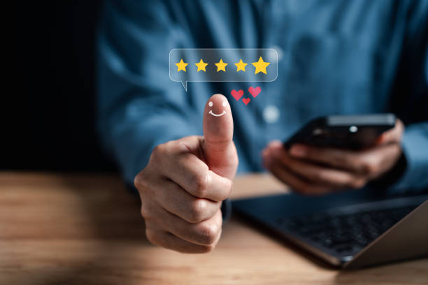 istock Businessman showing five star on hands, Customer satisfaction feedback review concept. Customer online service experience and business satisfaction. 1469297762
