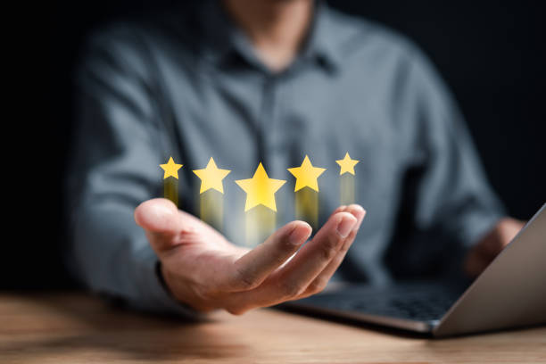 istock Businessman showing five star on hands, Customer satisfaction feedback review concept. Customer online service experience and business satisfaction. 1469297786