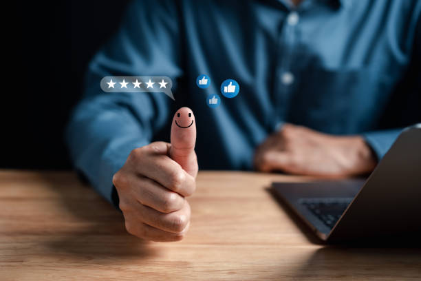 istock Businessman showing five star on hands, Customer satisfaction feedback review concept. Customer online service experience and business satisfaction. 1469297819