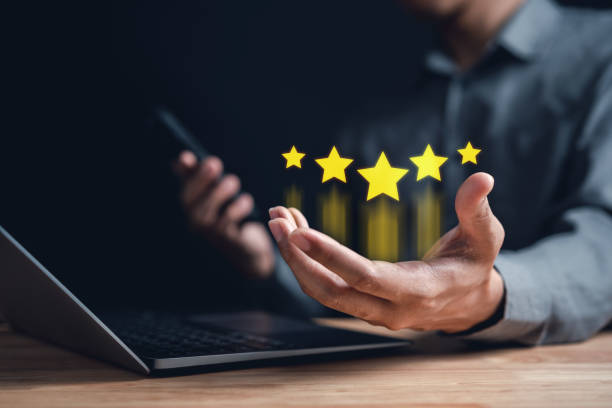 istock Businessman showing five star on hands, Customer satisfaction feedback review concept. Customer online service experience and business satisfaction. 1469297838