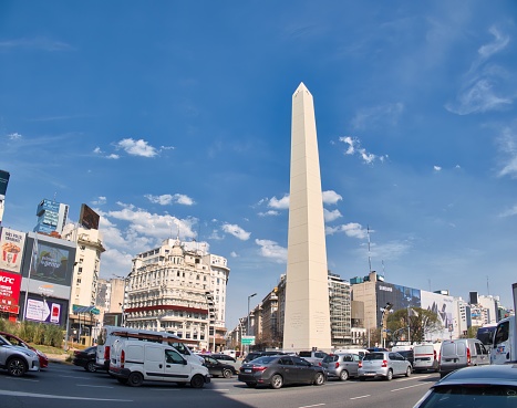 buenos aires, argentina - 28 October 2022: the world famous landmark of the city, the Obelisco on the avenida 9 de Julio downtown