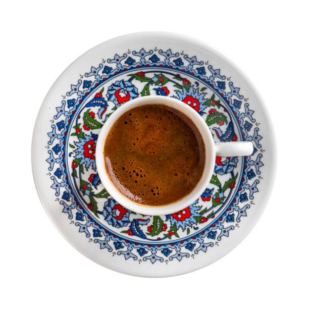 Turkish Coffee with traditional porcelain cup. Coffee presentation with Turkish delight. Sparkling Turkish Coffee.