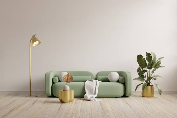 istock Green sofa with table on white wall and wooden flooring. 1469328252