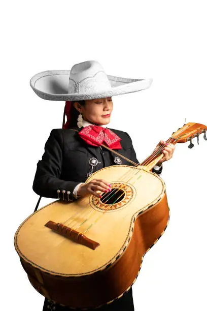 good looking latin hispanic musician feminine mariachi playing the guitarron