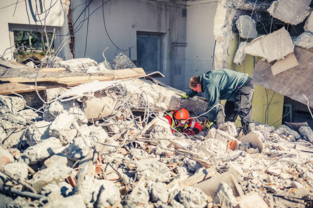 istock rescue forces search through a destroyed building 1469349697