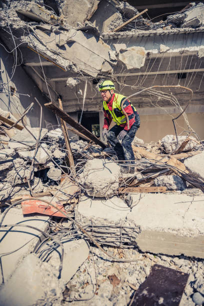 istock rescue forces search through a destroyed building 1469349807