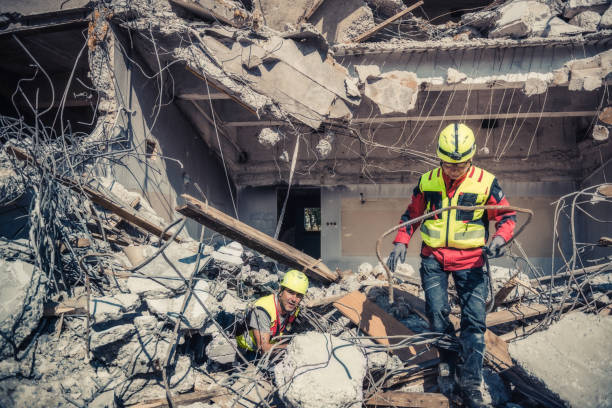 istock rescue forces search through a destroyed building 1469349864