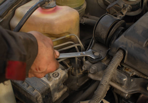 istock hand opens a metal bolt with a key 1469351310