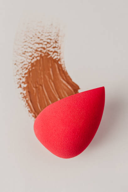 istock Makeup - Pink foundation sponge with foundation strokes 1469351363