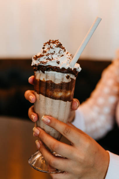 istock Chocolate milkshake with whipped cream and chocolate shavings 1469351529