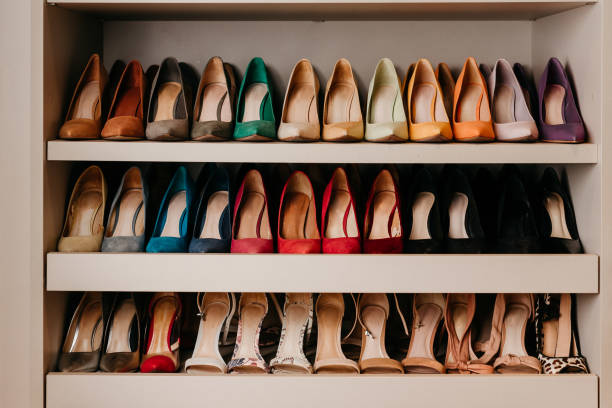 istock Organization - Shelves with shoes organized and lined up 1469353019