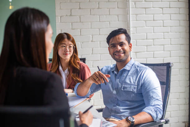 istock Putting Ideas into Action: Business Colleagues Planning for Success 1469357324