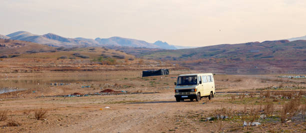 istock van in countryside Moroccan with plastic bag pollution,  Africa 1469373244
