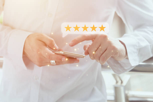istock user give five stars rating satisfied  feedback review for customer service or app experience quality survey concept 1469374730