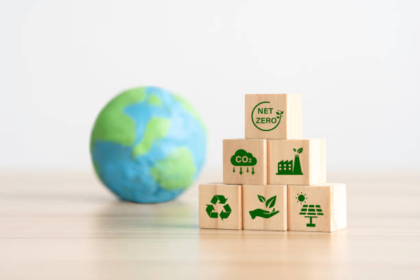istock green net zero icons on wooden cubes for Carbon neutral and net zero concept natural environment Climate-neutral long-term strategy greenhouse gas emissions targets 1469387320