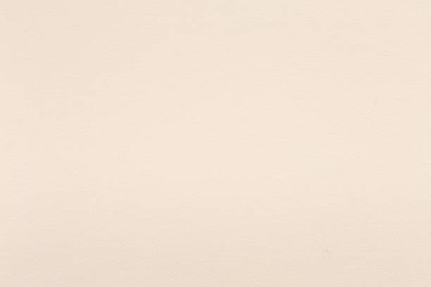 istock Blended cotton silk fabric textile wallpaper texture pattern background in light cream beige color tone. 1469387364