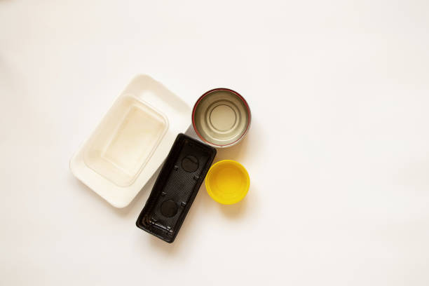istock Various plastic and canned jars and old packages lie on a white background, food containers on a white 1469387869