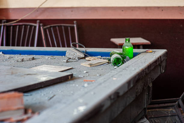istock Pool table and bottles left in rubble in the earthquake 1469390012