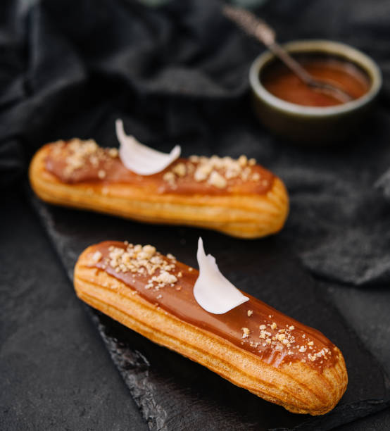 istock Traditional french dessert. eclair with caramel 1469399240