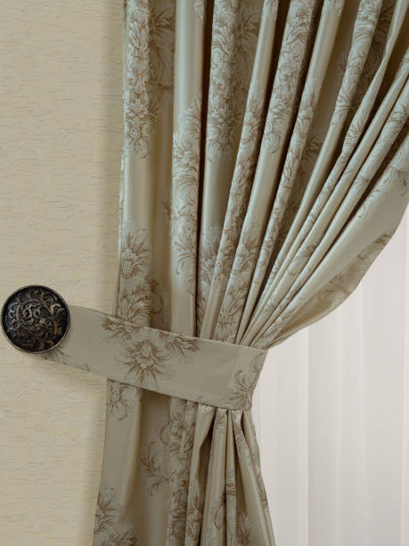 istock A beautiful curtain with a catch. Isolated white background. 1469405830