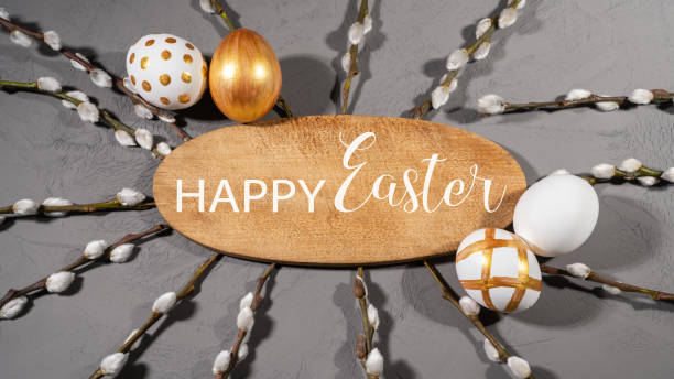 istock HAPPY EASTER holiday celebration backgroud - Golden painted easter eggs in a plate with wooden sign with text, on concrete table texture, top view 1469407675
