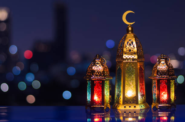 istock Selective focus on big lantern with night sky and city bokeh light background 1469408257