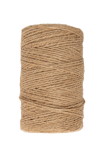 skein of natural jute twine isolated on white background, hemp thread, top view, roll twine for packaging, gift wrapping