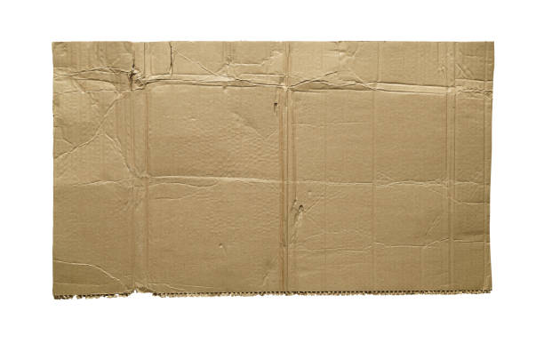 istock Brown old cardboard torn and isolated on white background. 1469422000