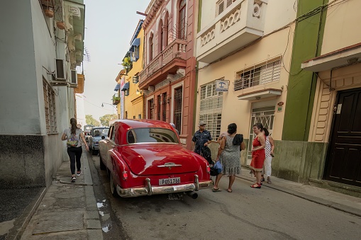 Havana, Cuba. February 20, 2023. Car from the 50's on the streets of Cuba. Cars with vibrant colors.