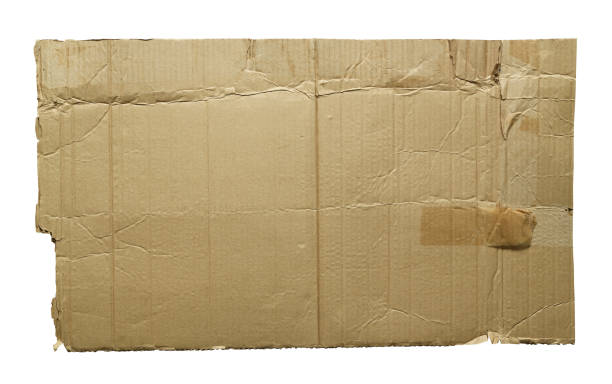 istock Brown old cardboard torn and isolated on white background. 1469449385