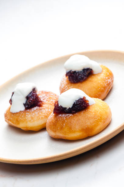 istock fried muffins with plum jam and sour cream 1469452868