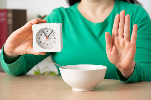 istock woman with an intermittent fasting diet 1469454363