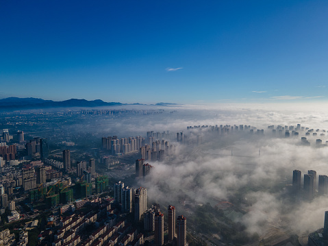 An aerial view of a modern city in the morning