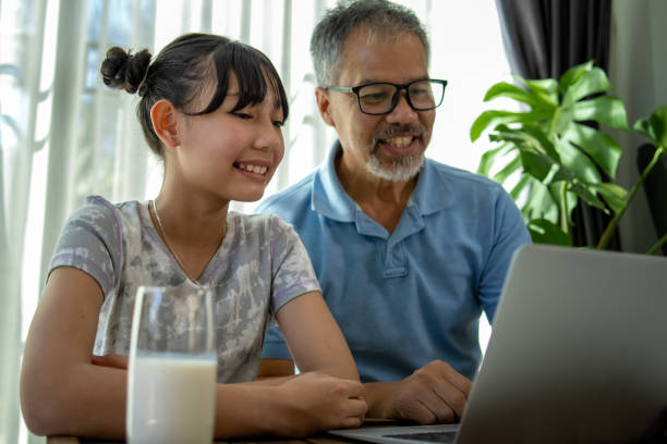 istock father and daughter shopping online on tablet 1469455711