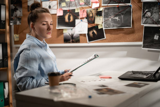 istock Smart detective attentively at evaluating clues while working in her office. 1469457622
