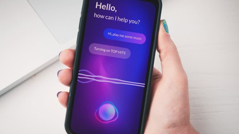 Woman using smart virtual assistant on her smartphone. AI voice assistant app for mobile phone.