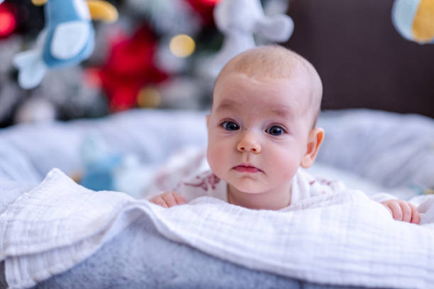 istock The baby is lying on the bed 1469464895