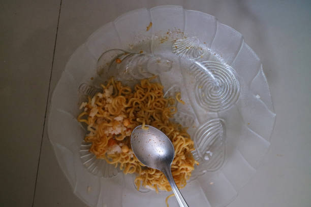 istock brown curly noodles on a clear glass plate 1469467065