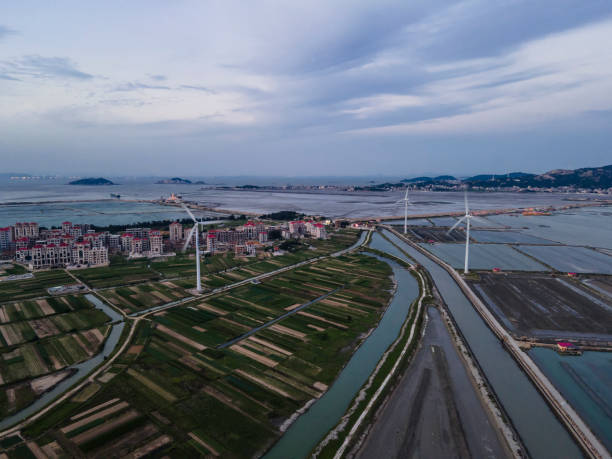 istock Windmills in the countryside by the sea 1469467882
