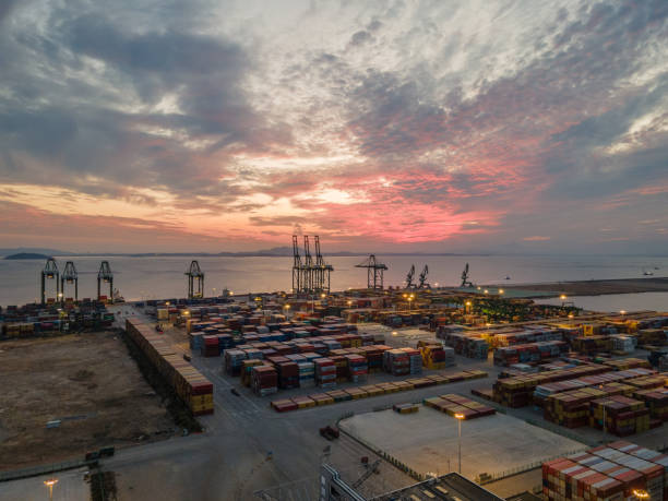istock Aerial view of container terminal at sunset 1469473650