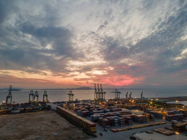 istock Aerial view of container terminal at sunset 1469473652