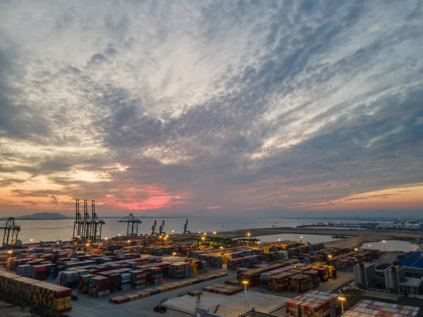 istock Aerial view of container terminal at sunset 1469473812