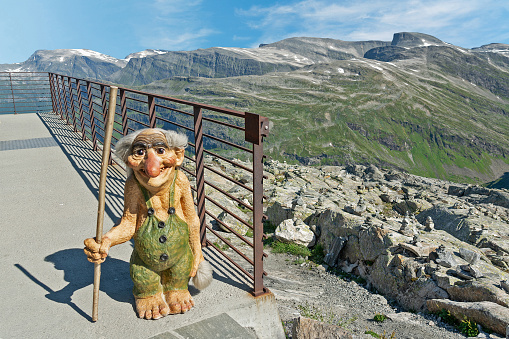 Geiranger, Norway - Sep 29, 2022: Troll figure on Dalsnibba mountain - personage of popular Scandinavian folklore. Skywalk viewpoint above Geiranger fjord.
