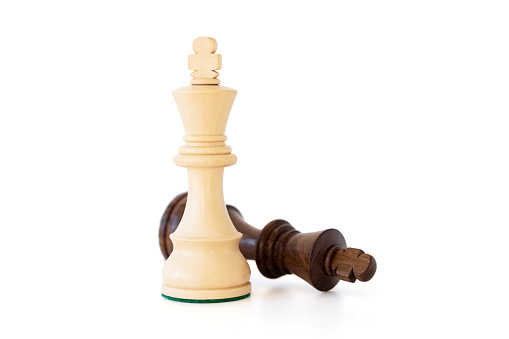 Concept of winning in game of chess,  competition, victory and defeat