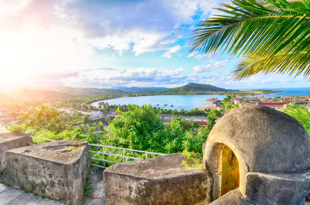 Baracoa Bay at sunset, Cuba Baracoa was discovered by Christopher Columbus during his first voyage, on 27th November 1492. El Yunque famous mountain in background baracoa stock pictures, royalty-free photos & images